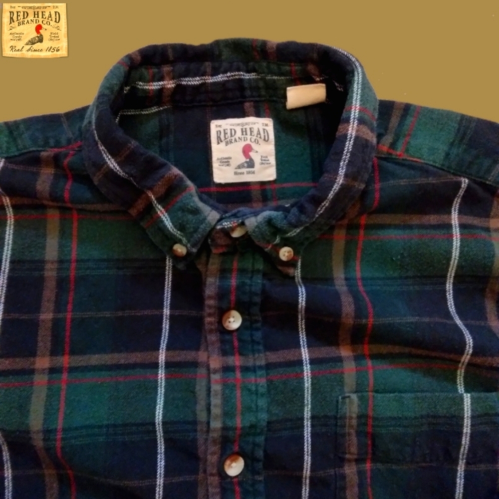 Red head plaid shirt.